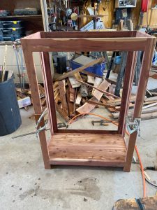 Mirror frame stained and installed